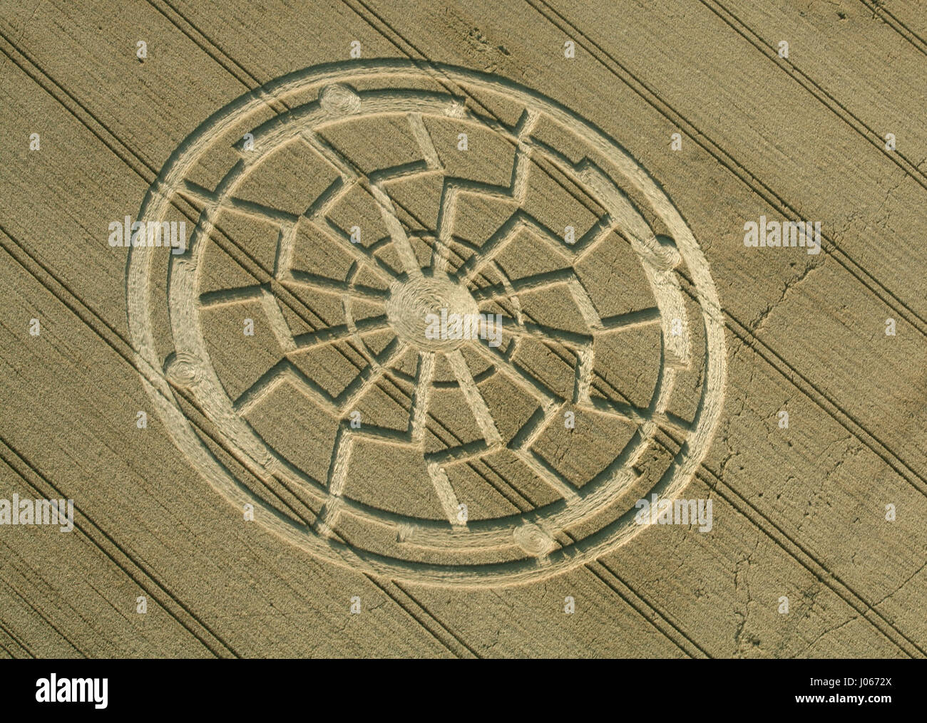 Bowerchalke, Wiltshire, UK: A CROP CIRCLE researcher claims the mysterious phenomenon is a temporary relief for Parkinson’s disease sufferers. In a story similar to the Oscar-winning 1985 fantasy film Cocoon, where the elderly have the signs of old age reversed by beings from another world, some British researchers now claim crop circles could have a similar effect in reality. Twenty-five years of study by scientific researcher Lucy Pringle, from Hampshire has revealed the beneficial effects of being inside a crop circle for sufferers of Parkinson’s disease. People suffering from the disease h Stock Photo