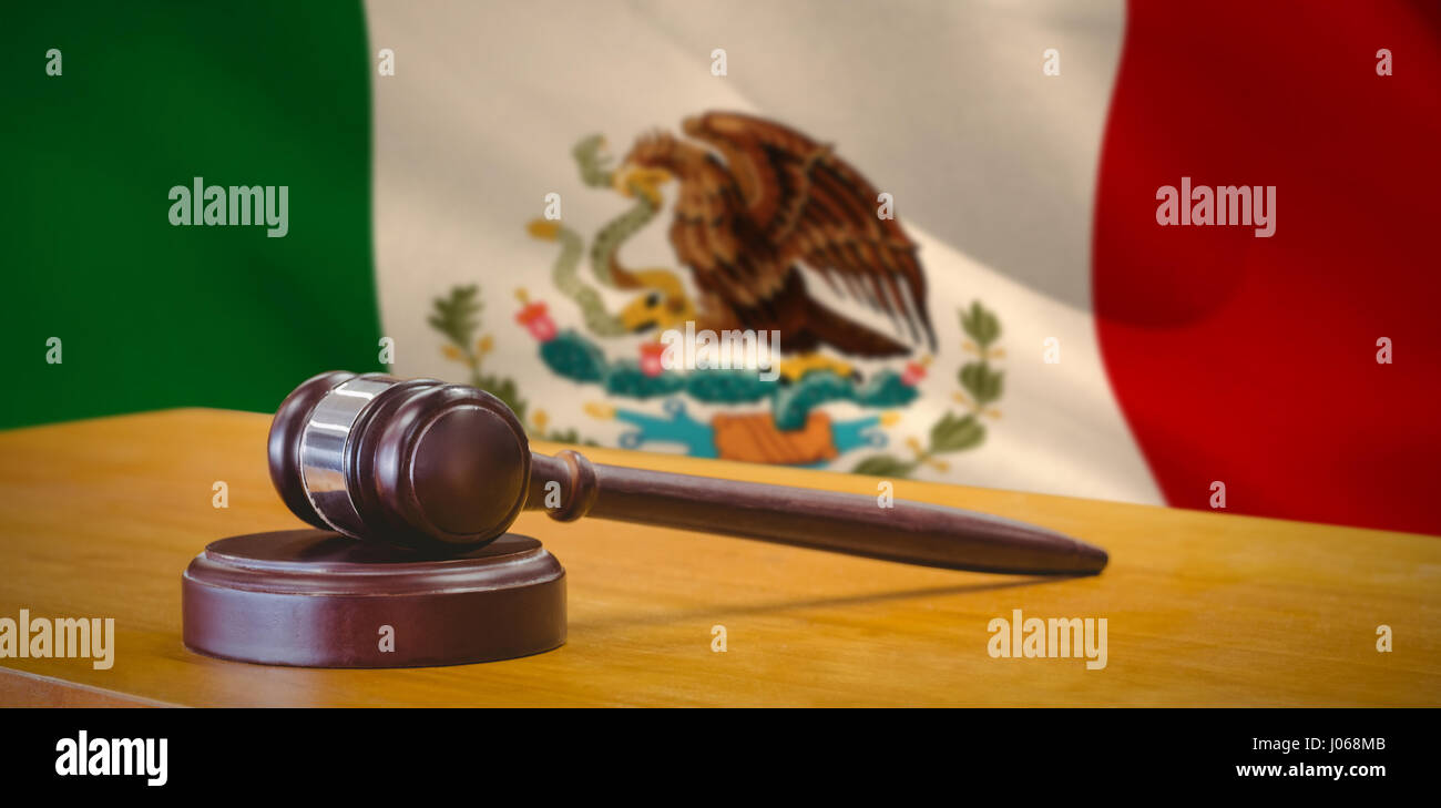 Hammer and gavel against 3d against digitally generated mexican
