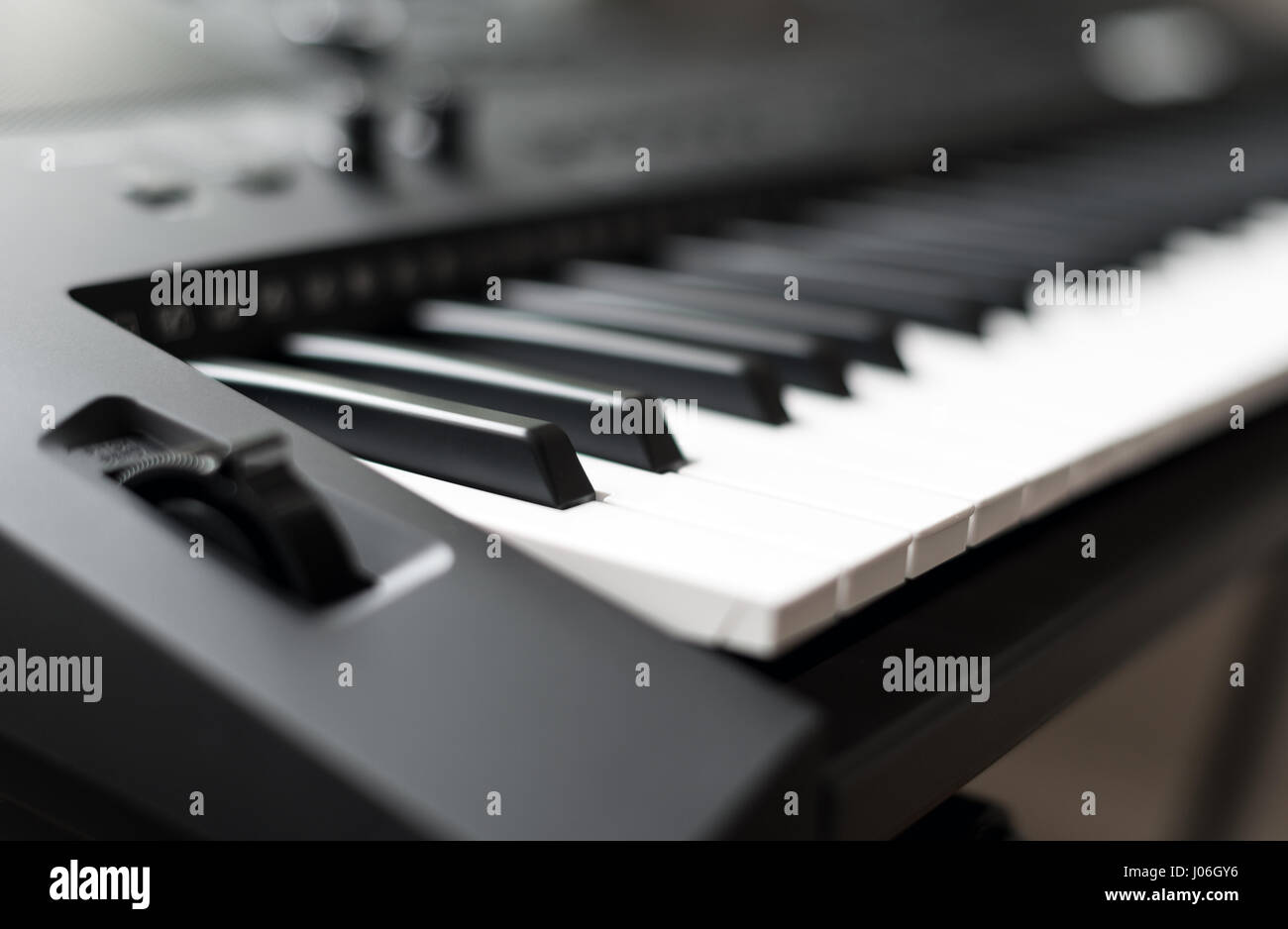 Professional midi keyboard synthesizer with knobs and controllers Stock