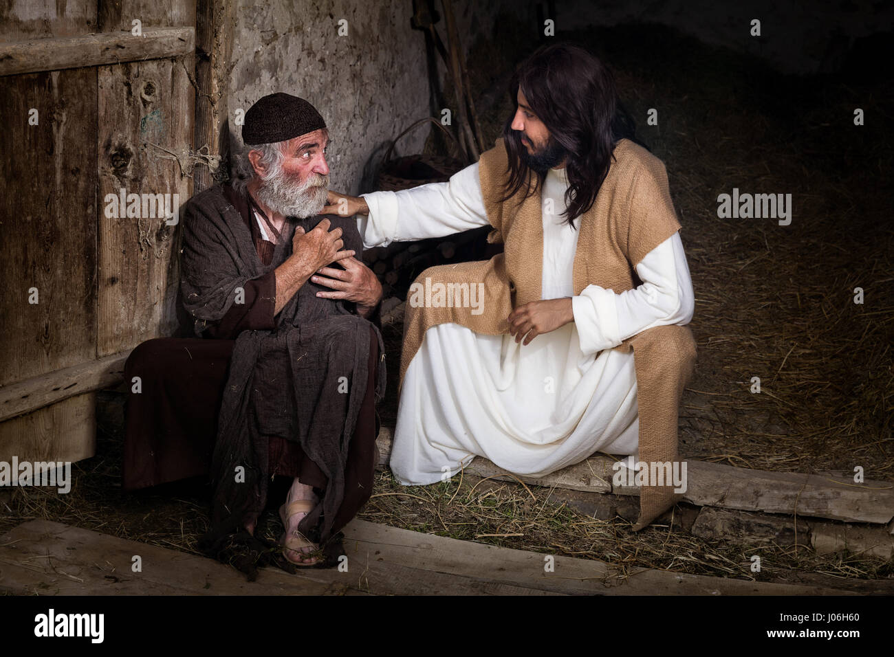 Jesus healing the lame or crippled man Stock Photo - Alamy