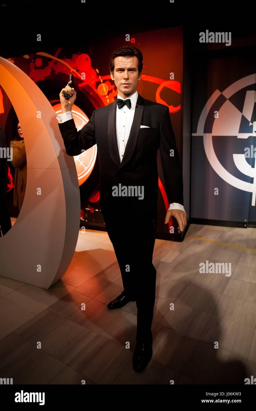 Wax figure of Pierce Brosnan as James Bond 007 agent in Madame Tussauds Wax museum in Amsterdam, Netherlands Stock Photo
