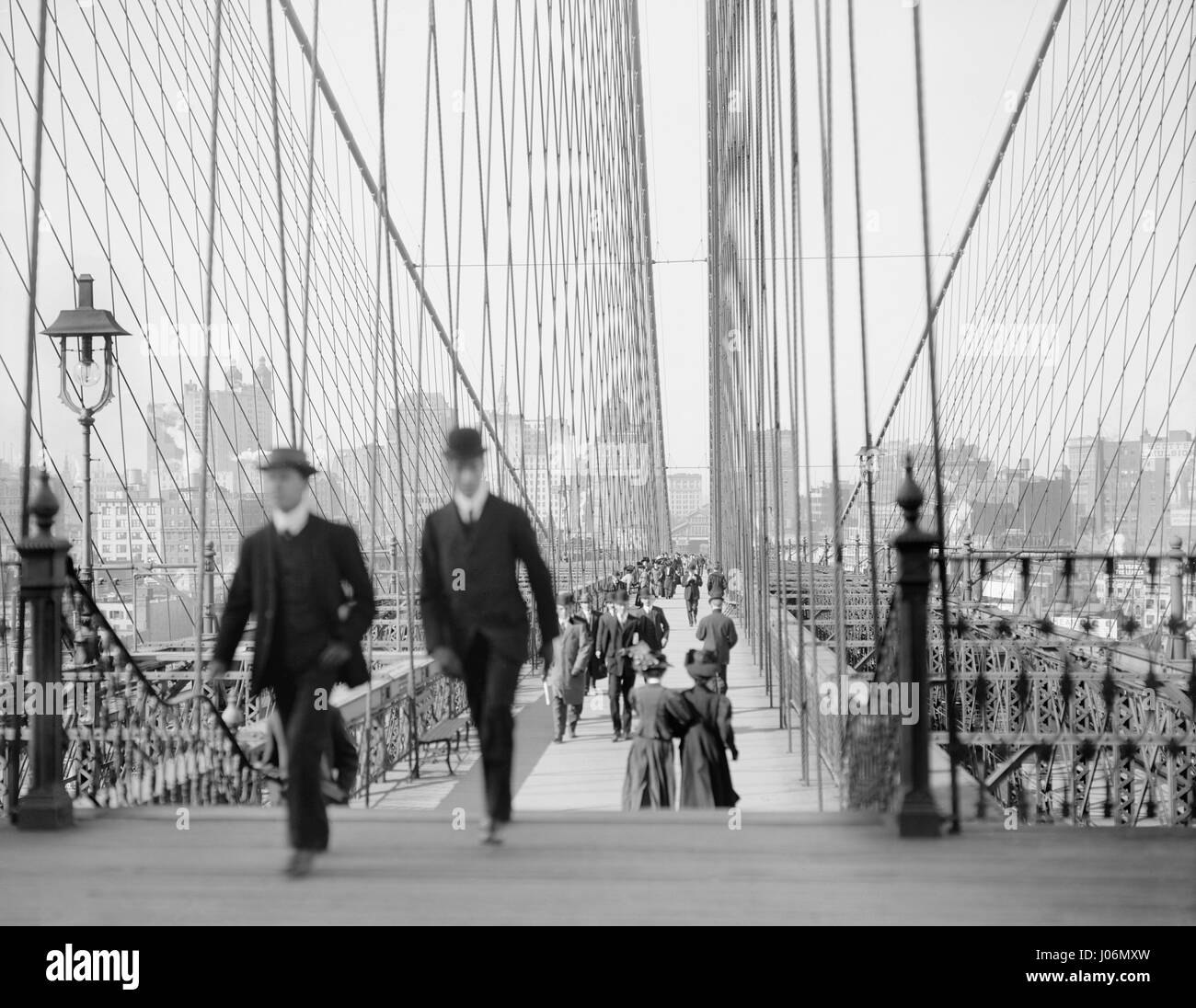 Pedestrians Walking Across Brooklyn Bridge, New York City, New York, USA, Detroit Publishing Company, 1905 Stock Photo