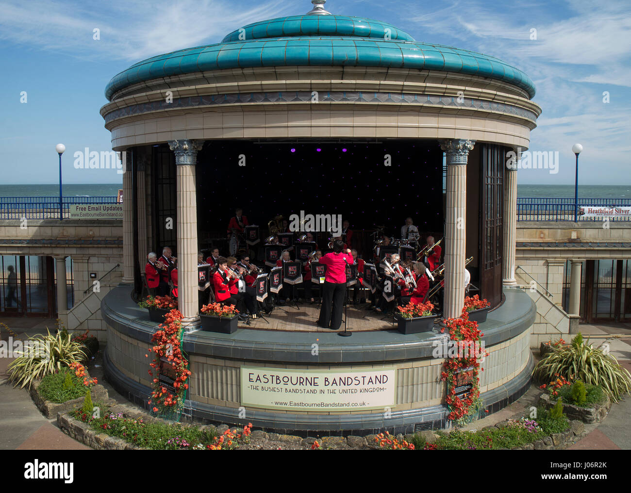 A band playing in bandstand on seafront at Eastbourne, East Sussex