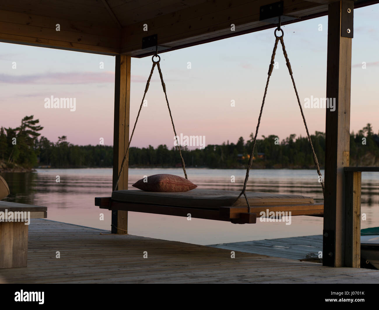 Swing chair on dock lake hires stock photography and images Alamy