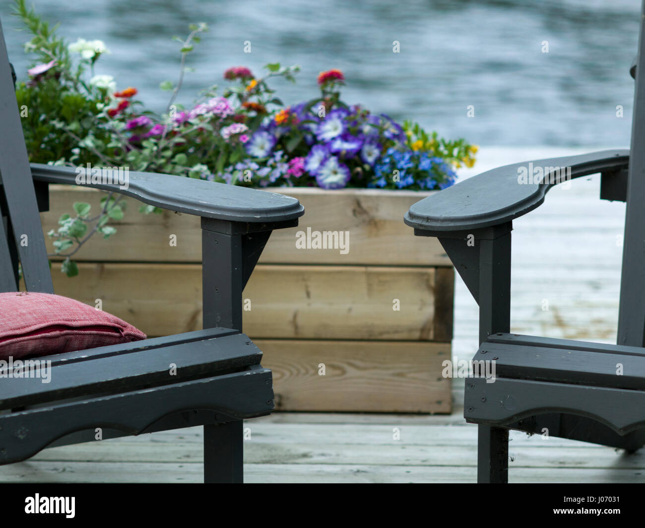 Adirondack chairs on a deck, Lake of the Woods, Ontario, Canada Stock ...