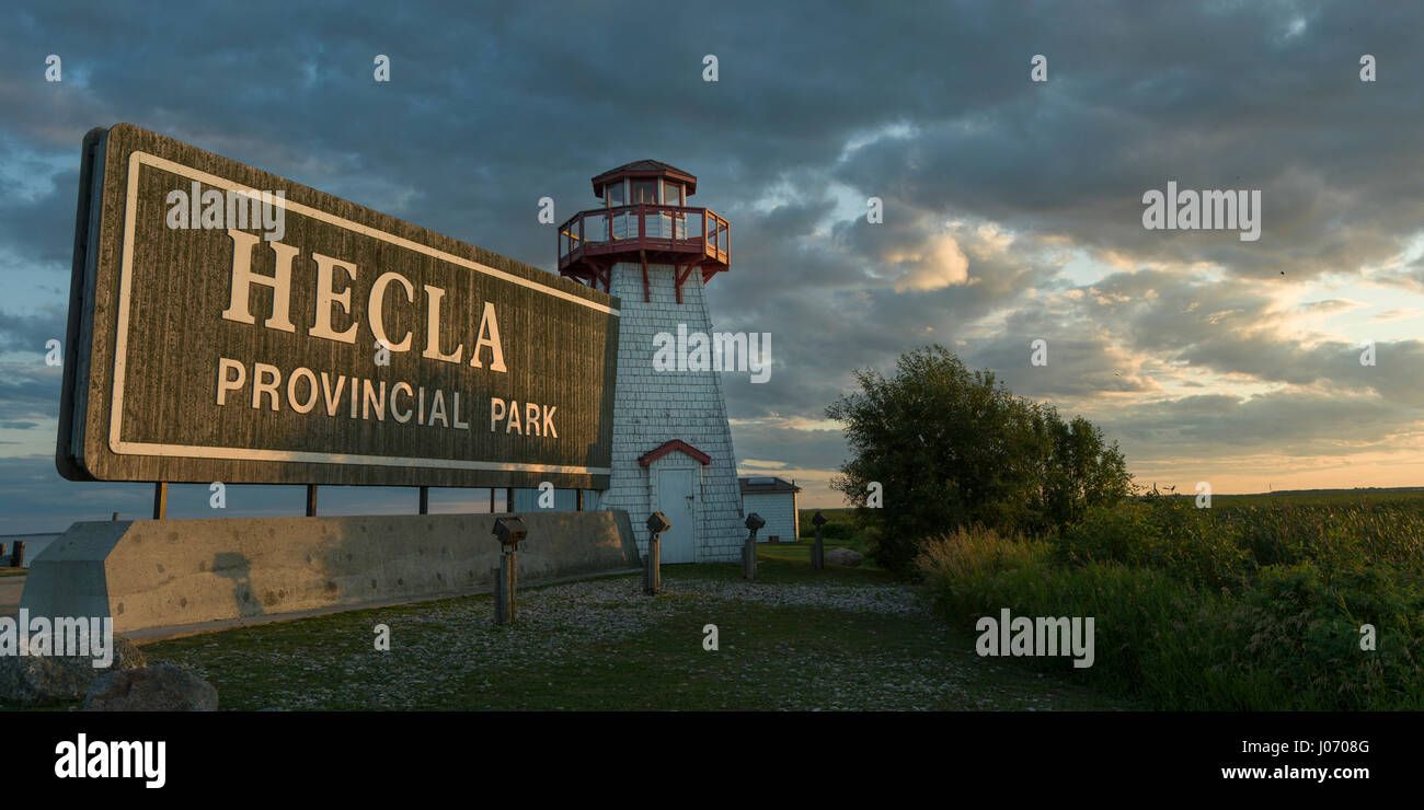 View of lighthouse against cloudy sky, HeclaGrindstone Provincial Park