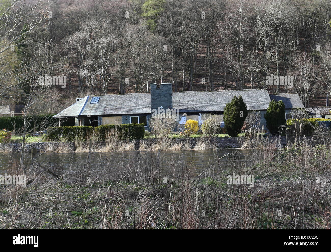 Flood damaged house beside River Eamont Pooley Bridge Cumbria UK April