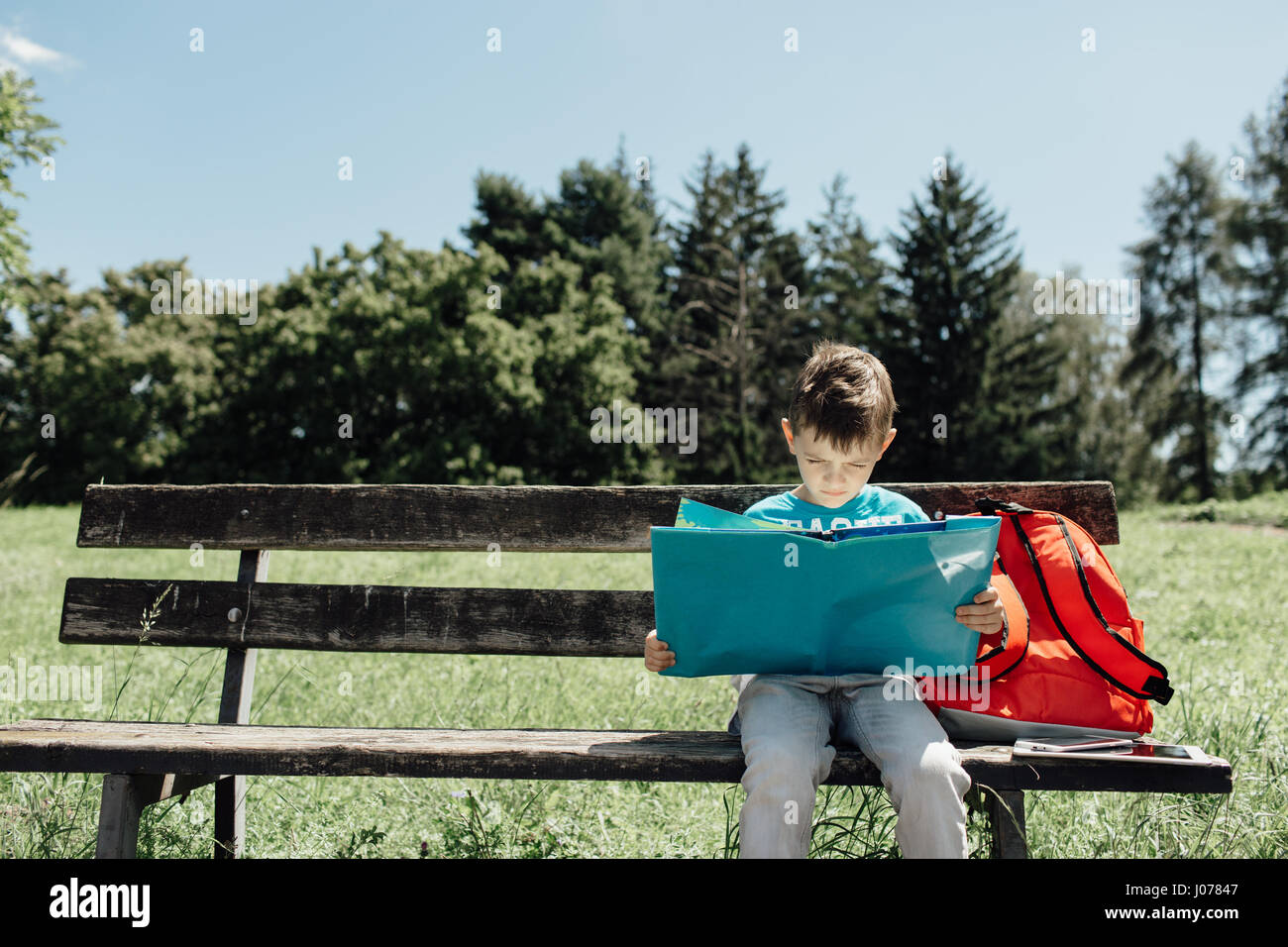 Boy Sitting Alone On Bench BOY SITTING ALONE ON BENCH