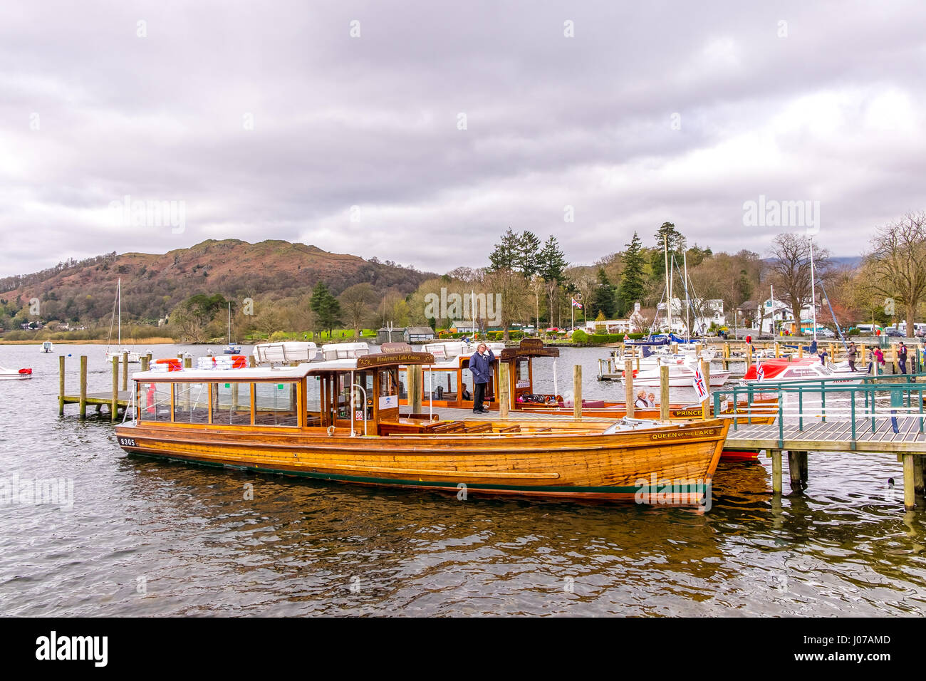 traditional wooden rowing boats on lake windermere near ambleside in
