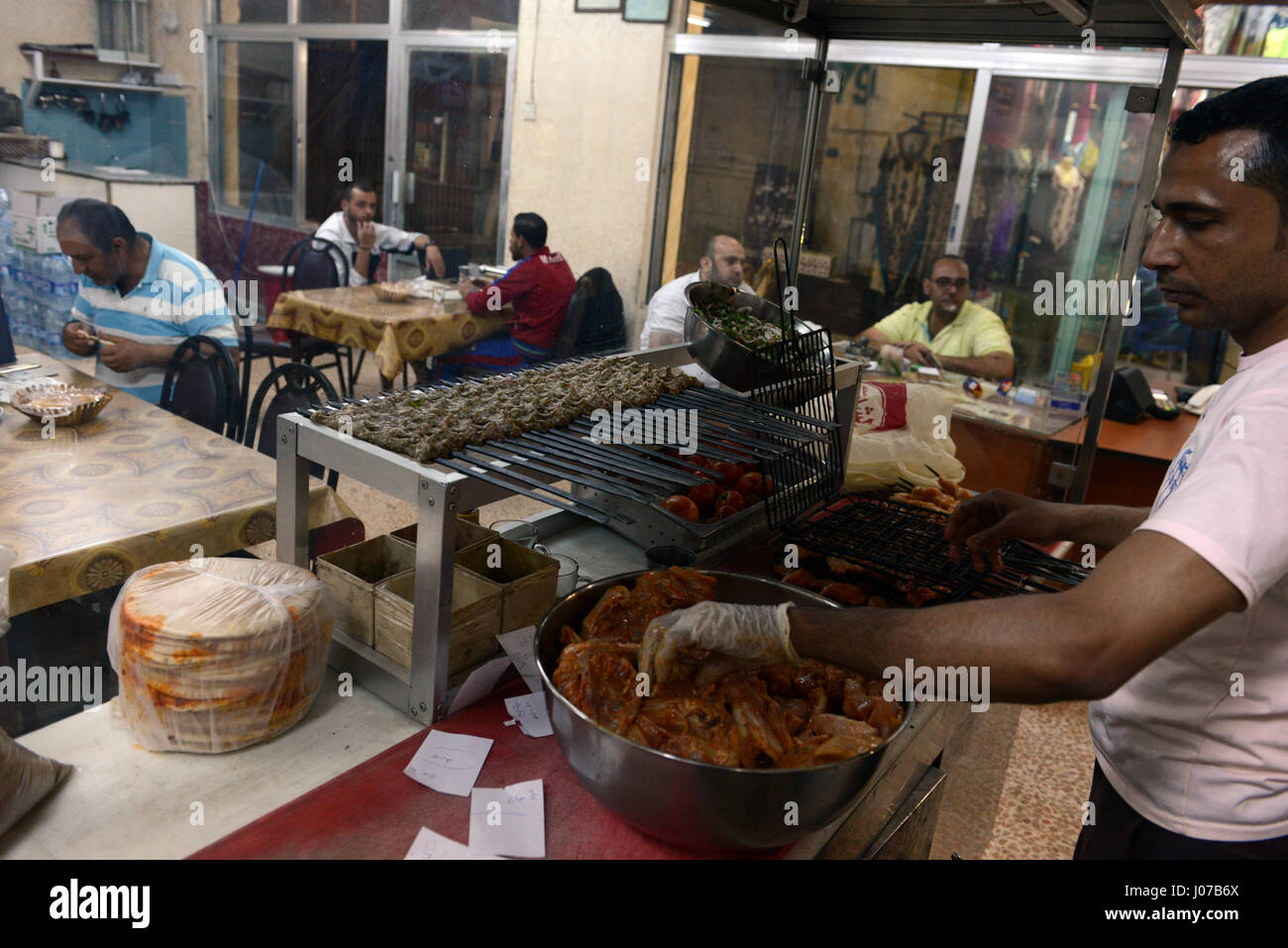Grilling kebabs in a restaurant in Aqaba, Jordan Stock Photo Alamy