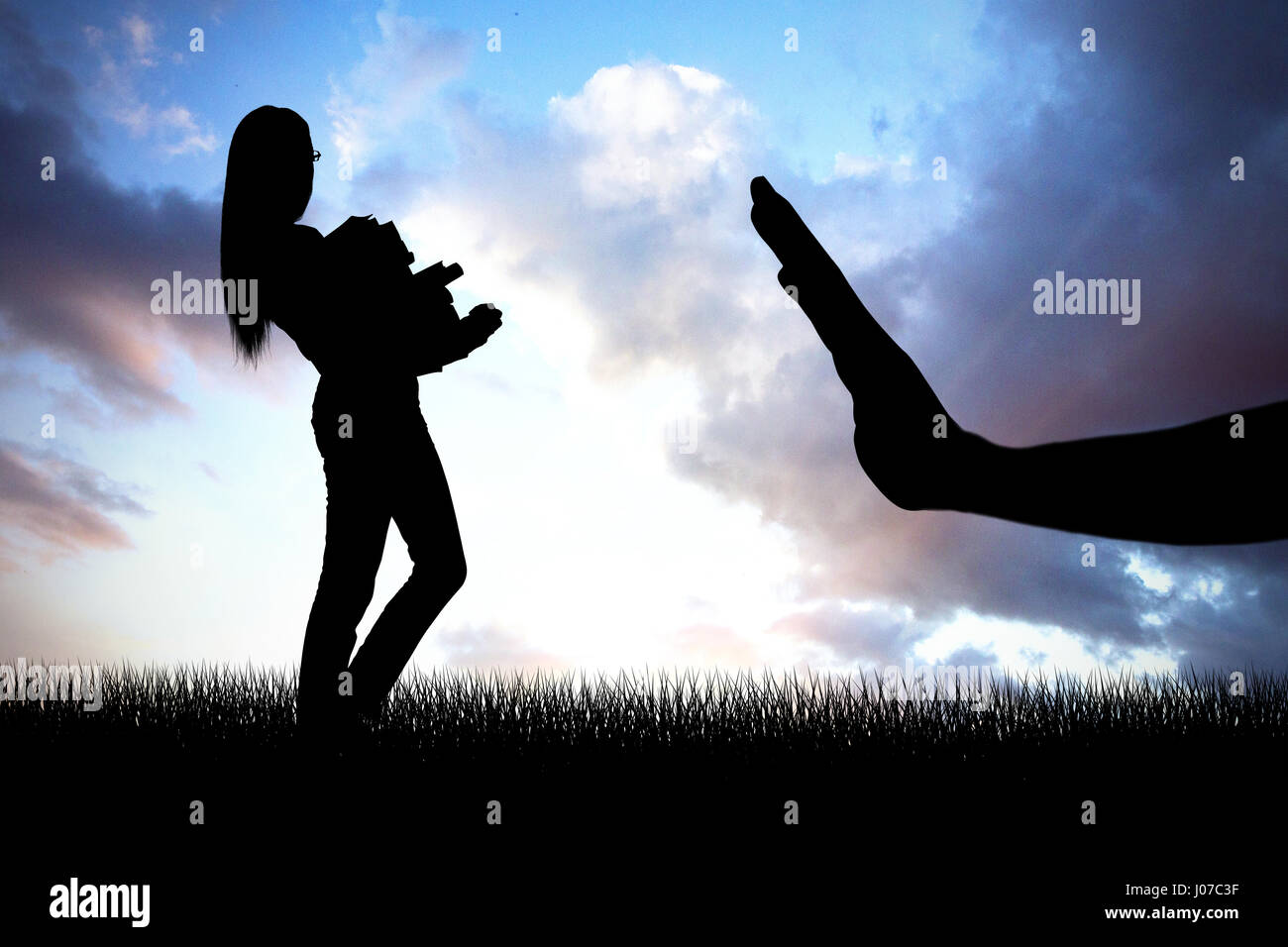 Side view of young woman carrying a pile of books against cloudy sky ...