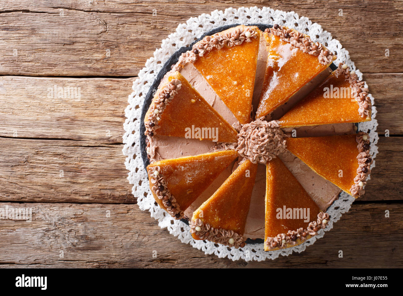 Tasty Hungarian Dobosh torte with caramel decoration close-up on a plate. horizontal view from above Stock Photo