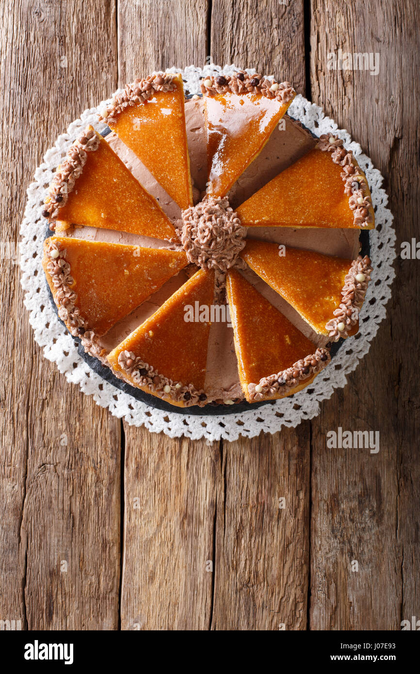 Tasty Hungarian Dobosh torte with caramel decoration close-up on a plate. Vertical view from above Stock Photo
