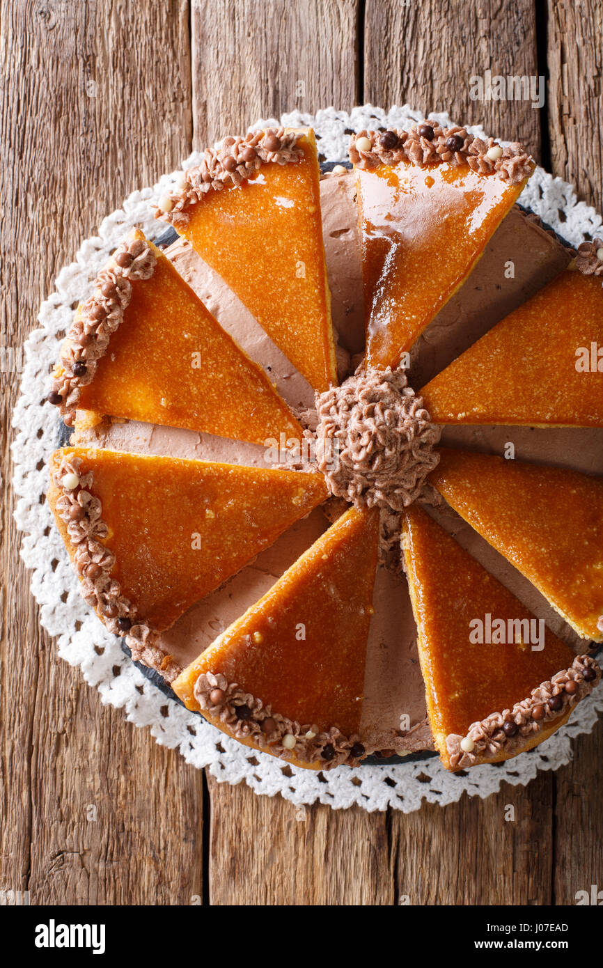 Hungarian Dobosh cake with caramel and butter cream close-up on a plate. Vertical view from above Stock Photo