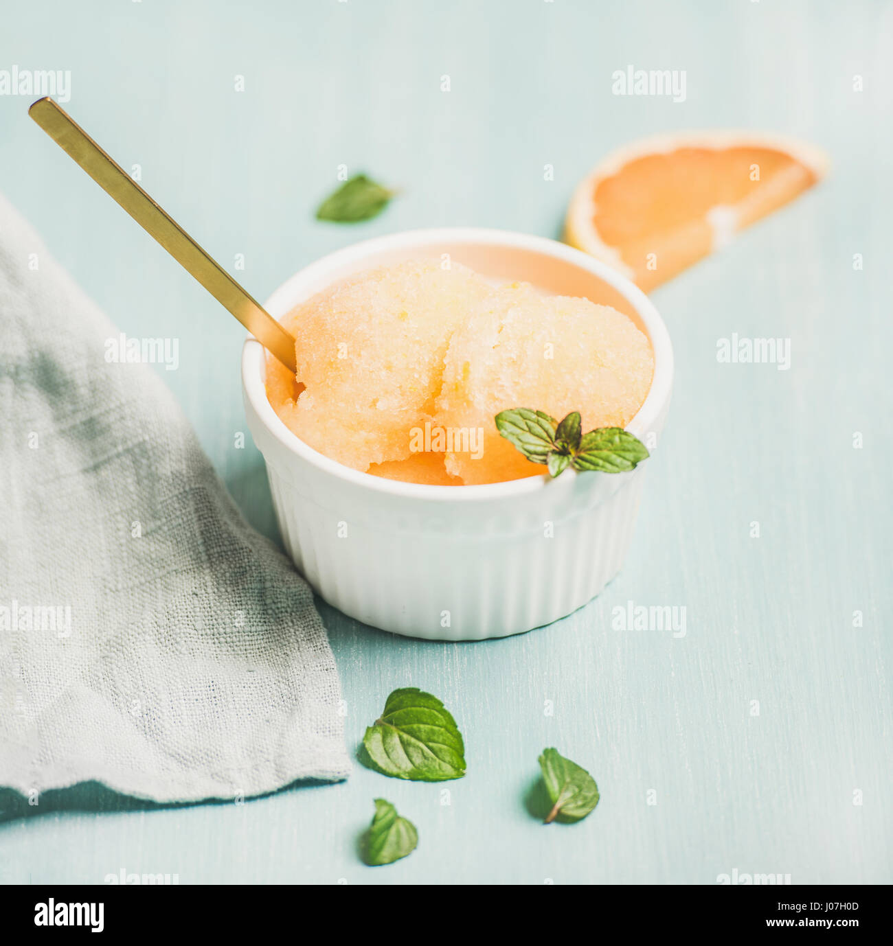 Pink grapefruit homemade sorbet with fresh mint leaves Stock Photo Alamy