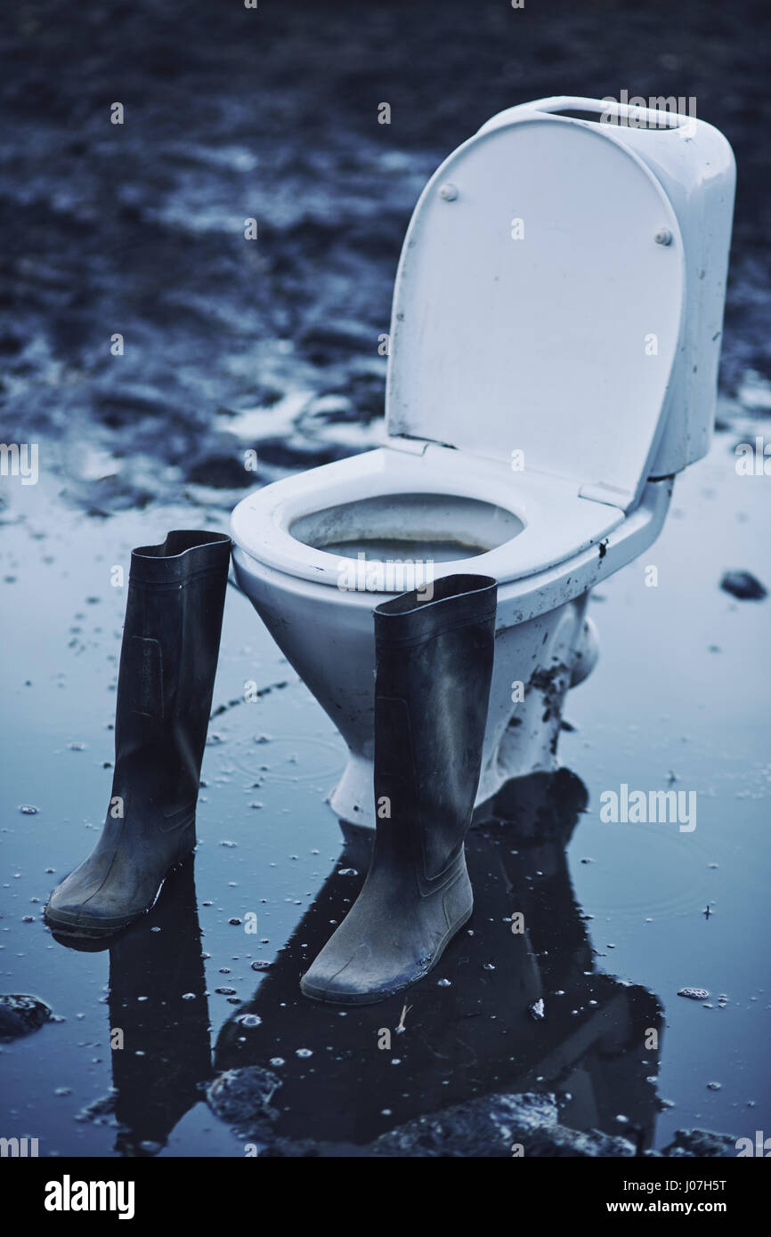 close up dirty flush toilet Standing in a puddle Stock Photo Alamy