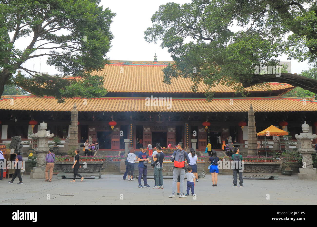 People visit Guangxiao Temple in Guangzhou China. Guangxiao Temple is