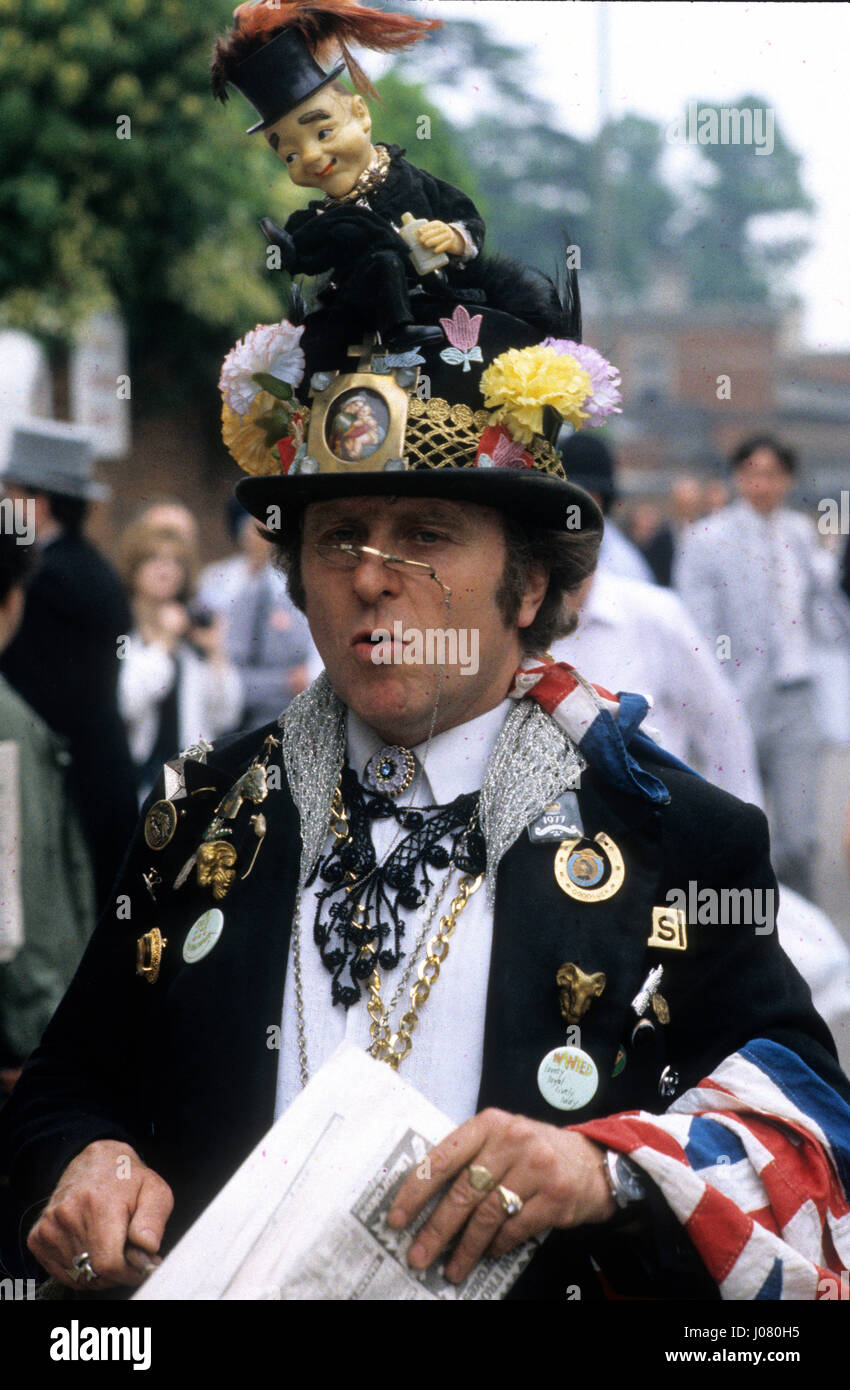 Man wearing a bizarre top hat arriving at Royal Ascot races June 1988 Stock Photo