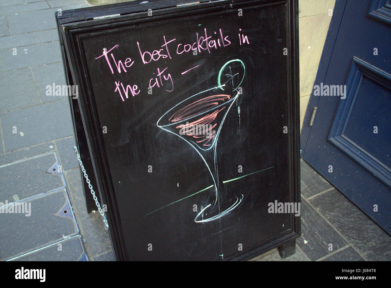 best cocktails in the city alcohol pub restaurant advertising sign chalk blackboard Stock Photo