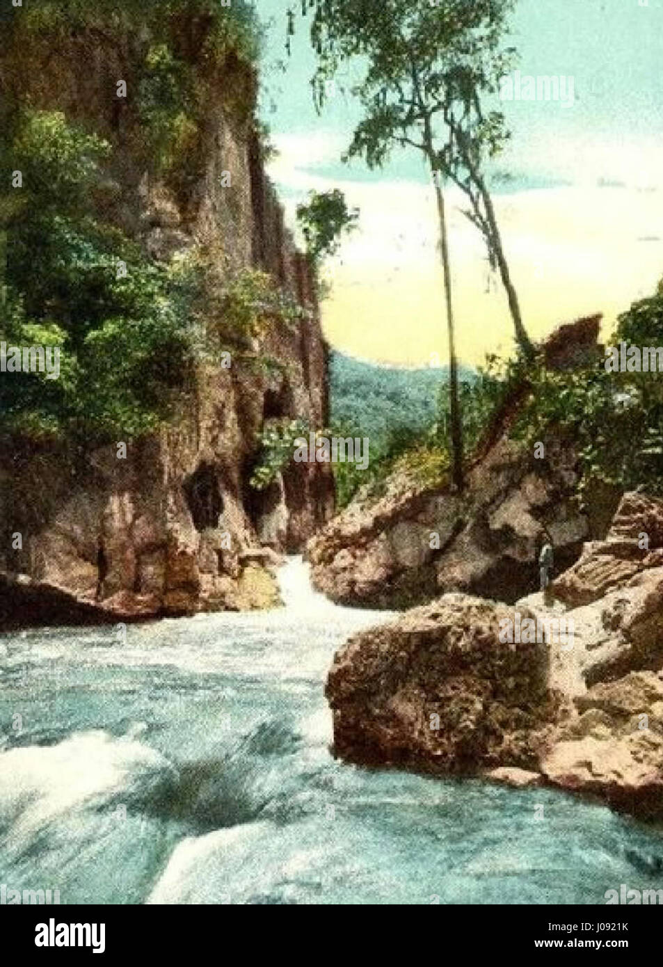 The 'Cañon del río Guaire' is a natural landmark in Venezuela, known for its stunning rock formations and scenic views. The 2013 derivative captures its grandeur through a modern lens. Stock Photo