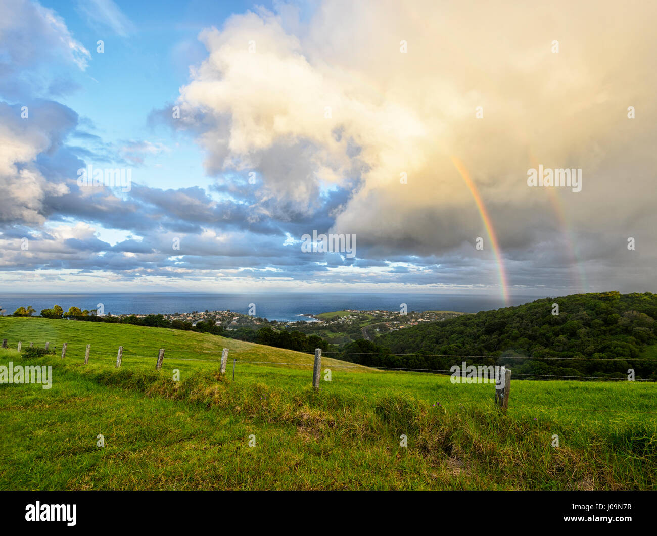 Stormy weather with double rainbow over Kiama, seen from Saddleback Mountain, Illawarra Coast, New South Wales, NSW, Australia Stock Photo