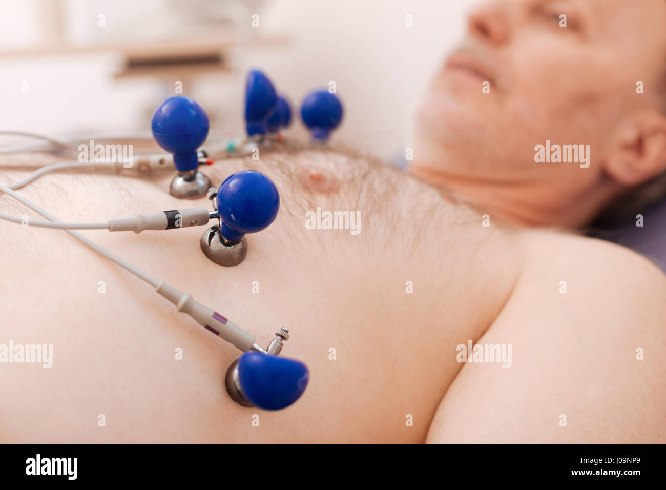Hospital patient undergoing electrocardiogram hi-res stock photography ...