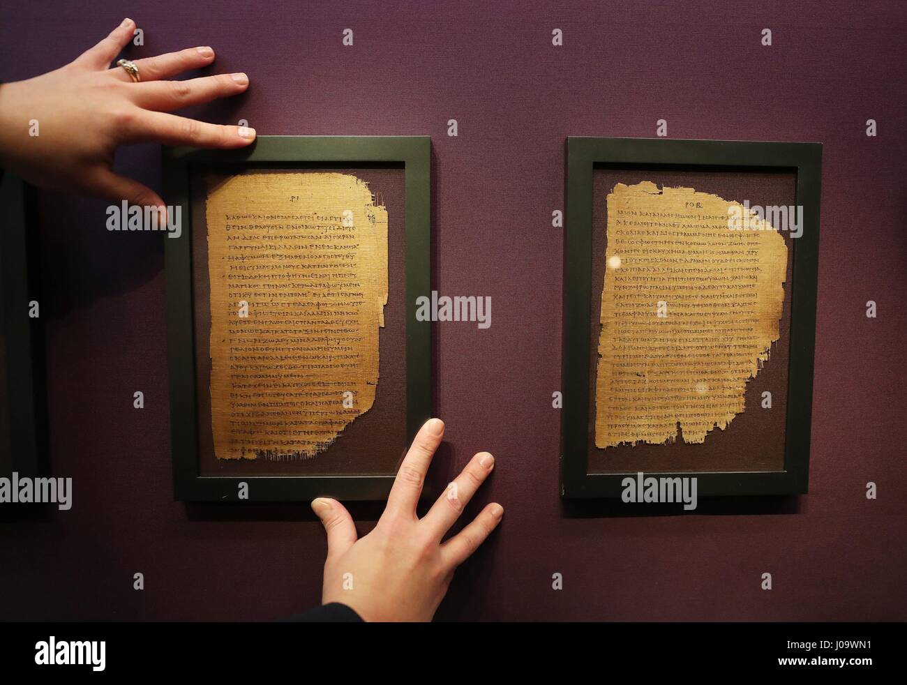 First Corinthians 14:34 - 15:5 of Pauline Epistles (left) on display as some of the oldest surviving biblical manuscripts with a direct link to early Christianity have gone on display at the Chester Beatty library in Dublin. Stock Photo
