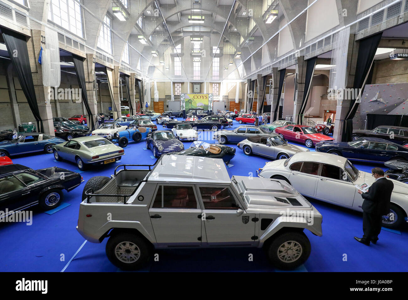 70 classic cars on display including a 1991 Lamborghini LM02 (foreground) during a preview for the upcoming Coys Spring Classics auction at the Royal Horticultural Society's Lindley Hall in London. Stock Photo