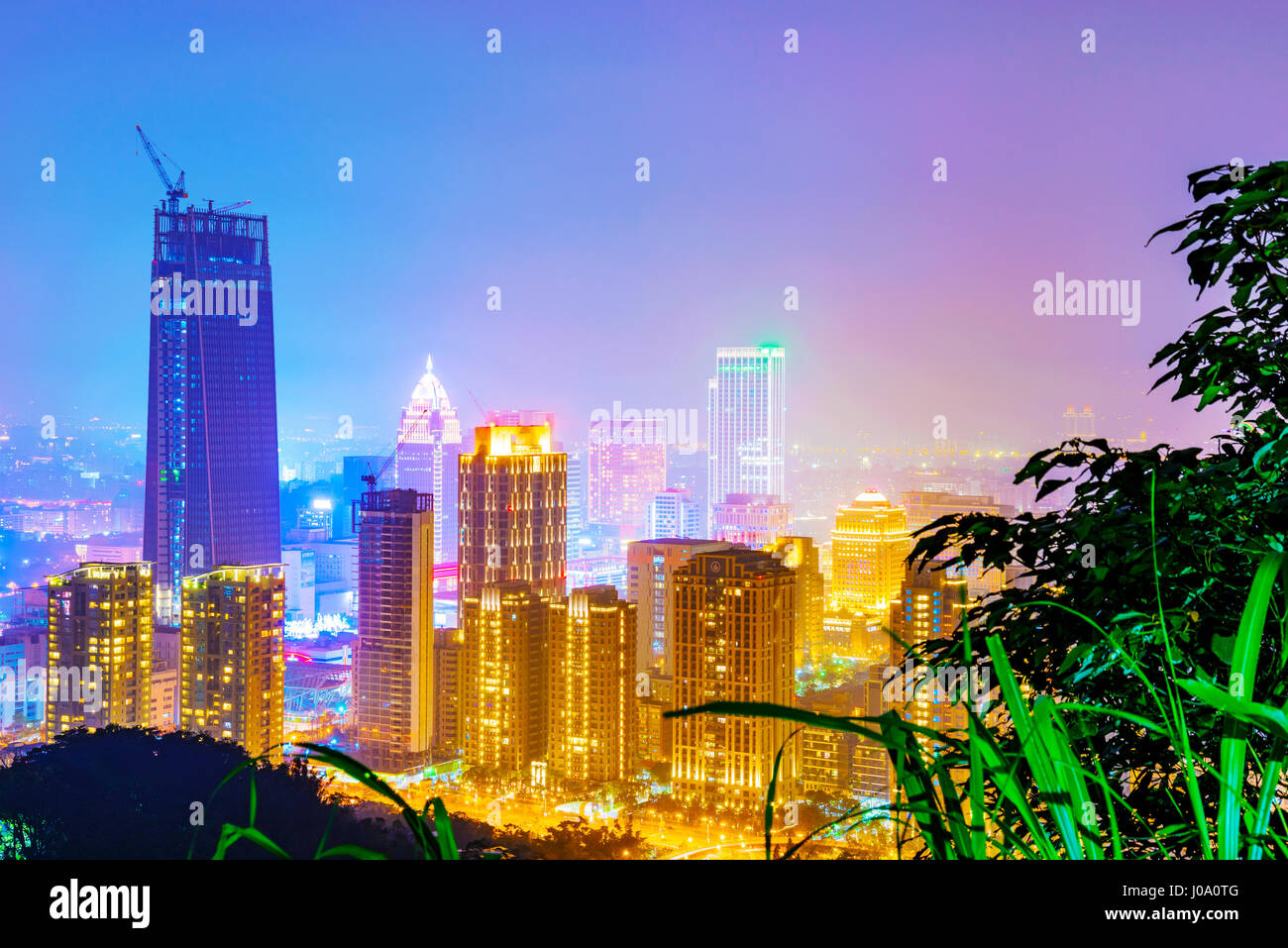 TAIPEI, TAIWAN - MARCH 20: This is a view of Xinyi financial district in the downtown area of Taipei taken from a mountain at night on March 20, 2017  Stock Photo