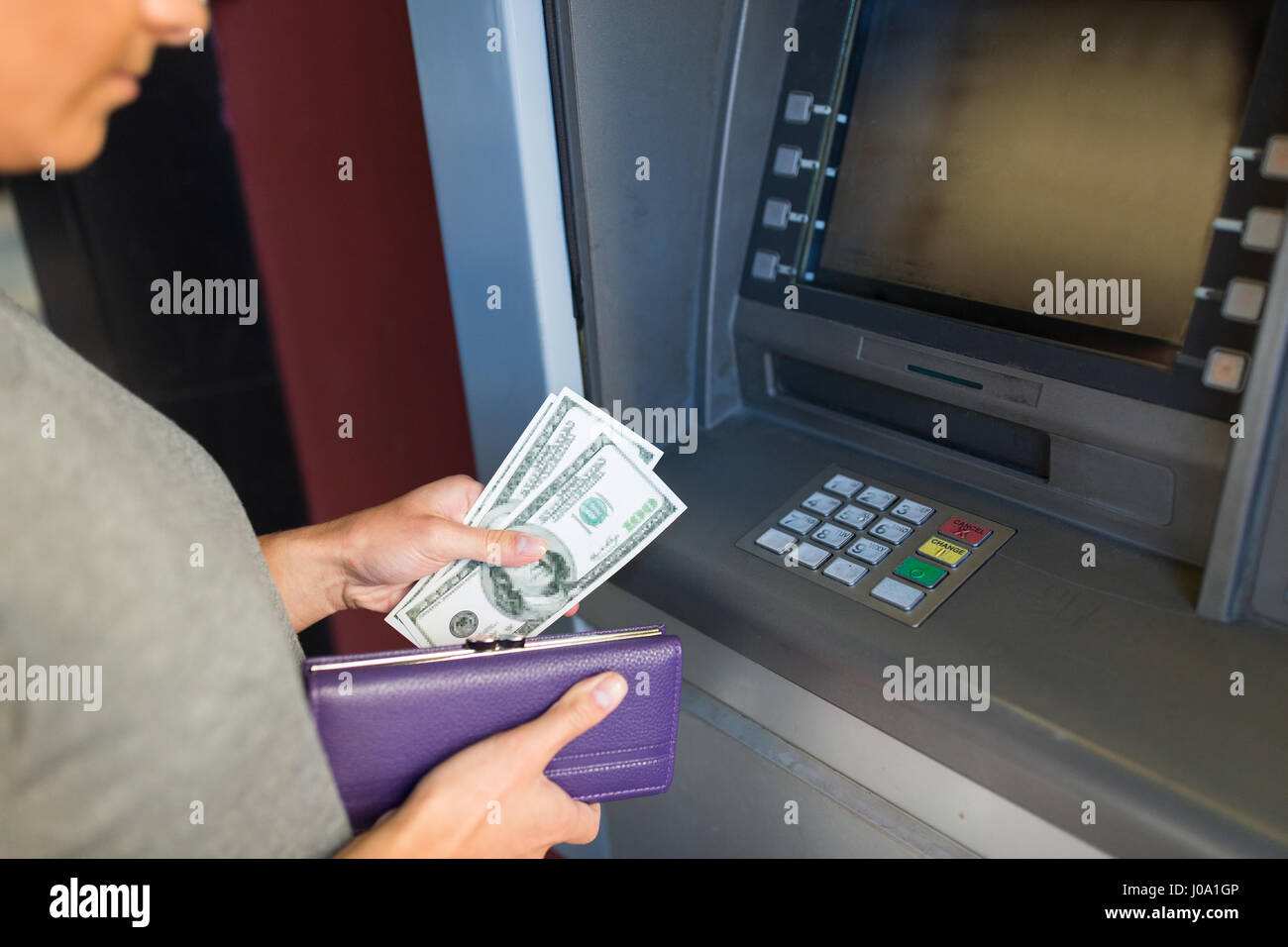 close up of hand withdrawing money at atm machine Stock Photo