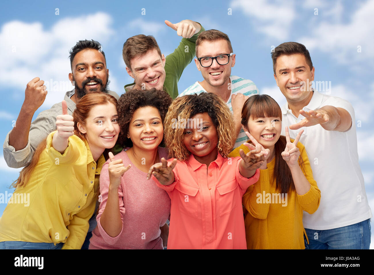 international group of people showing thumbs up Stock Photo - Alamy