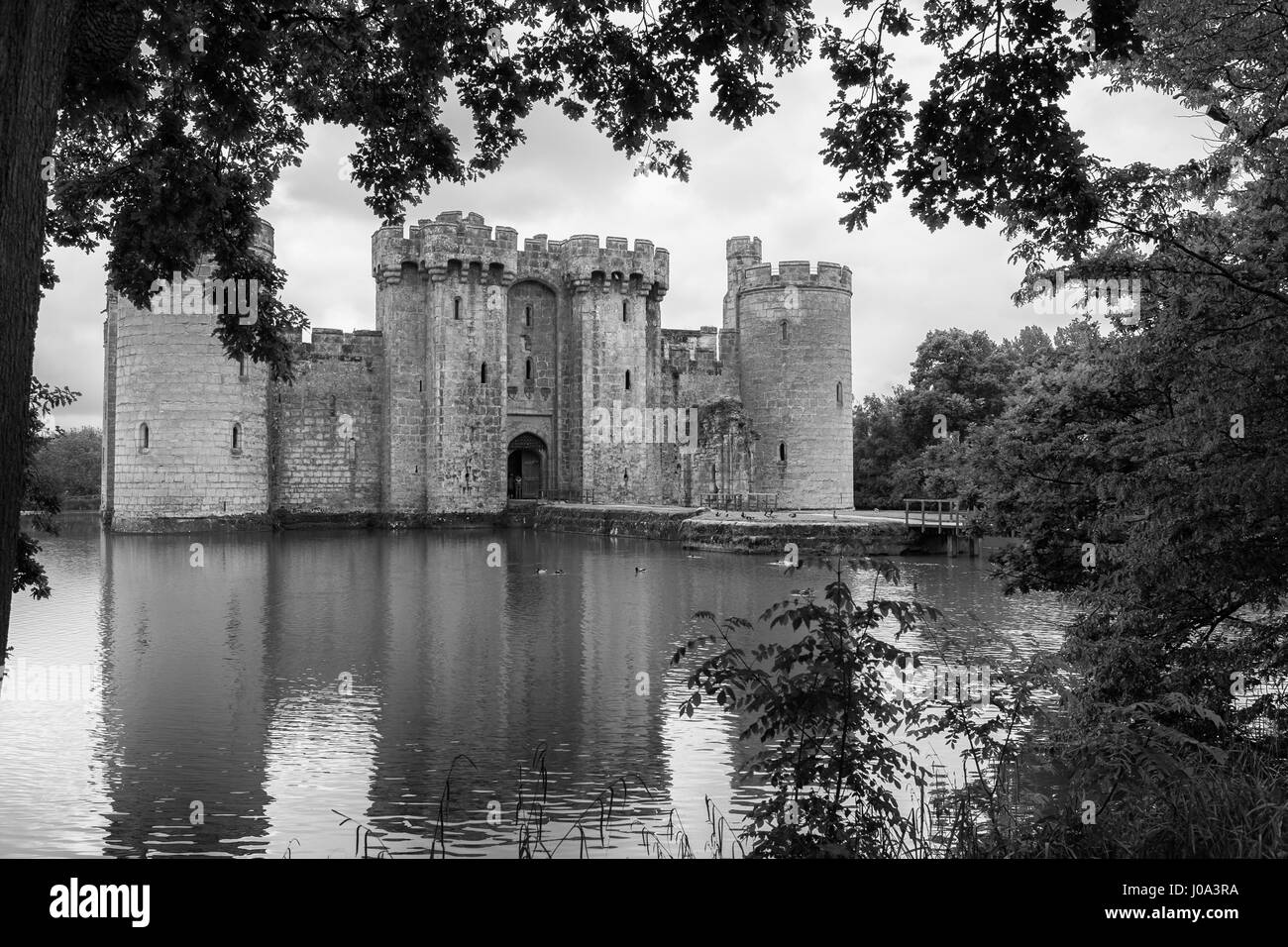 Medieval Bodiam Castle, East Sussex, England, UK: 14th century moated castle ruins.  Black and white version Stock Photo