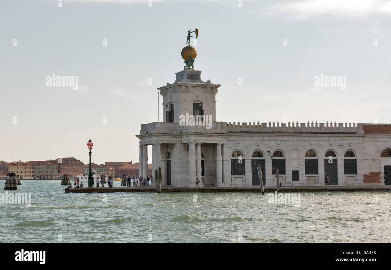 VENICE, ITALY - SEPTEMBER 23, 2016: Unrecognized people visit Punta della Dogane, former Customs House in Dorsoduro district. Venice is one of the wor Stock Photo