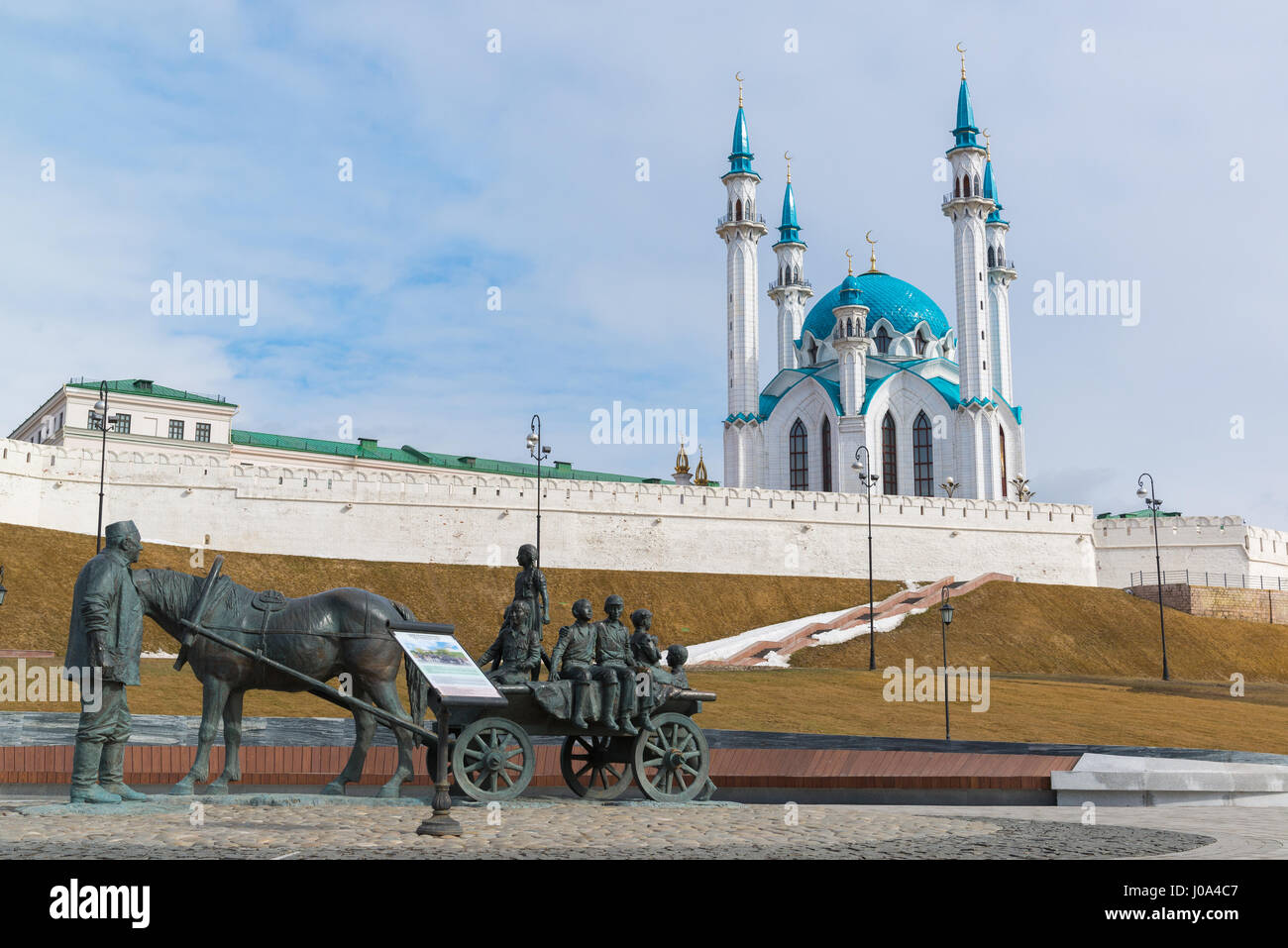 Kazan, Russia - March 28.2017. Monument to benefactor against backdrop of Kazan Kremlin. Russia, Republic of Tatarstan Stock Photo
