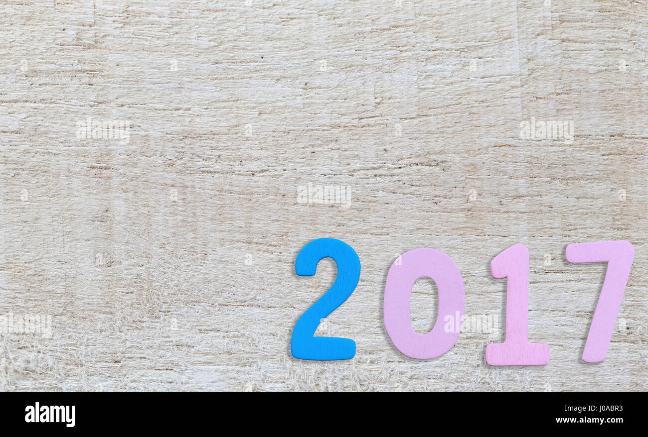 Number of 2017 on a white wood background in concept of the New Year ...