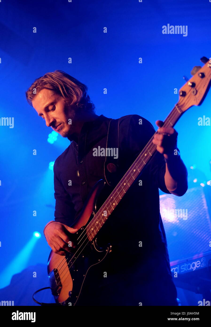 Bassist Like Ayling  with British band The Milk performing at the Engine Rooms Southampton UK Stock Photo