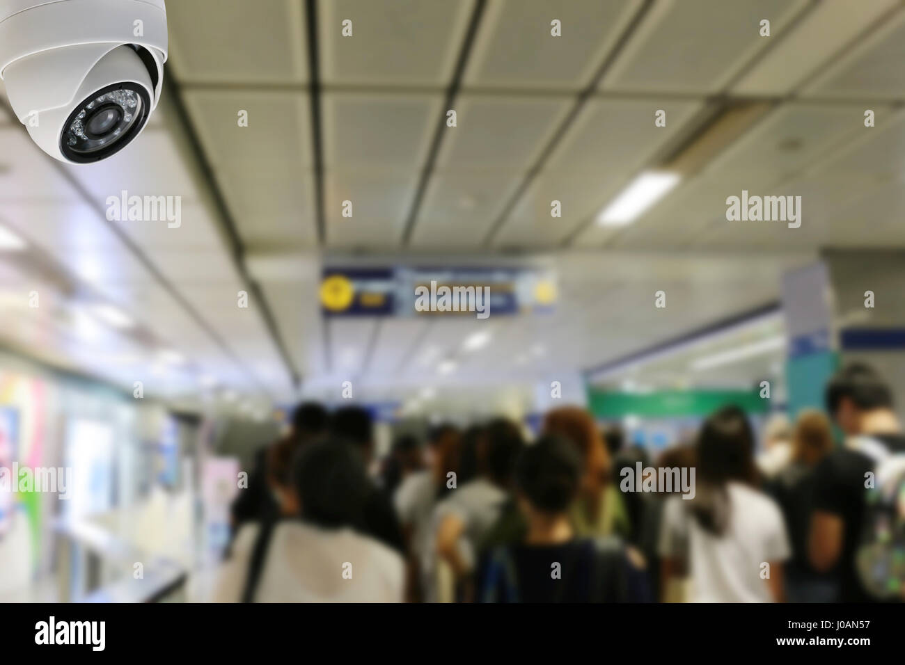 CCTV dome on the ceiling in the metro area in concept of security. Stock Photo