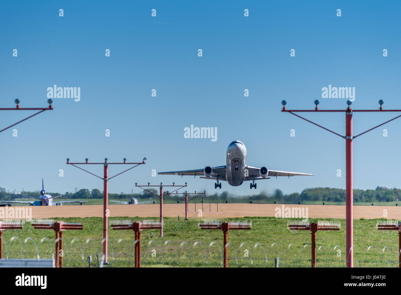 Jet airliner lifting off from Memphis International Airport in Memphis, Tennessee, USA. Stock Photo