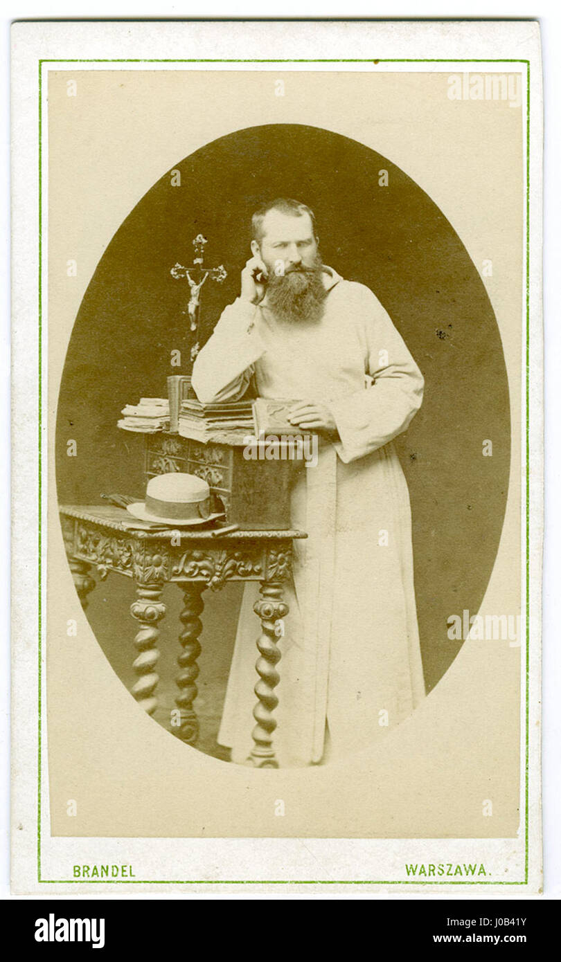 This 1876 photograph, taken by K. Brandel, features a portrait of Kamedula ks. Nowalski. It is preserved in the archival collections of the Warsaw Museum, offering insight into historical portrait photography in Poland. Stock Photo