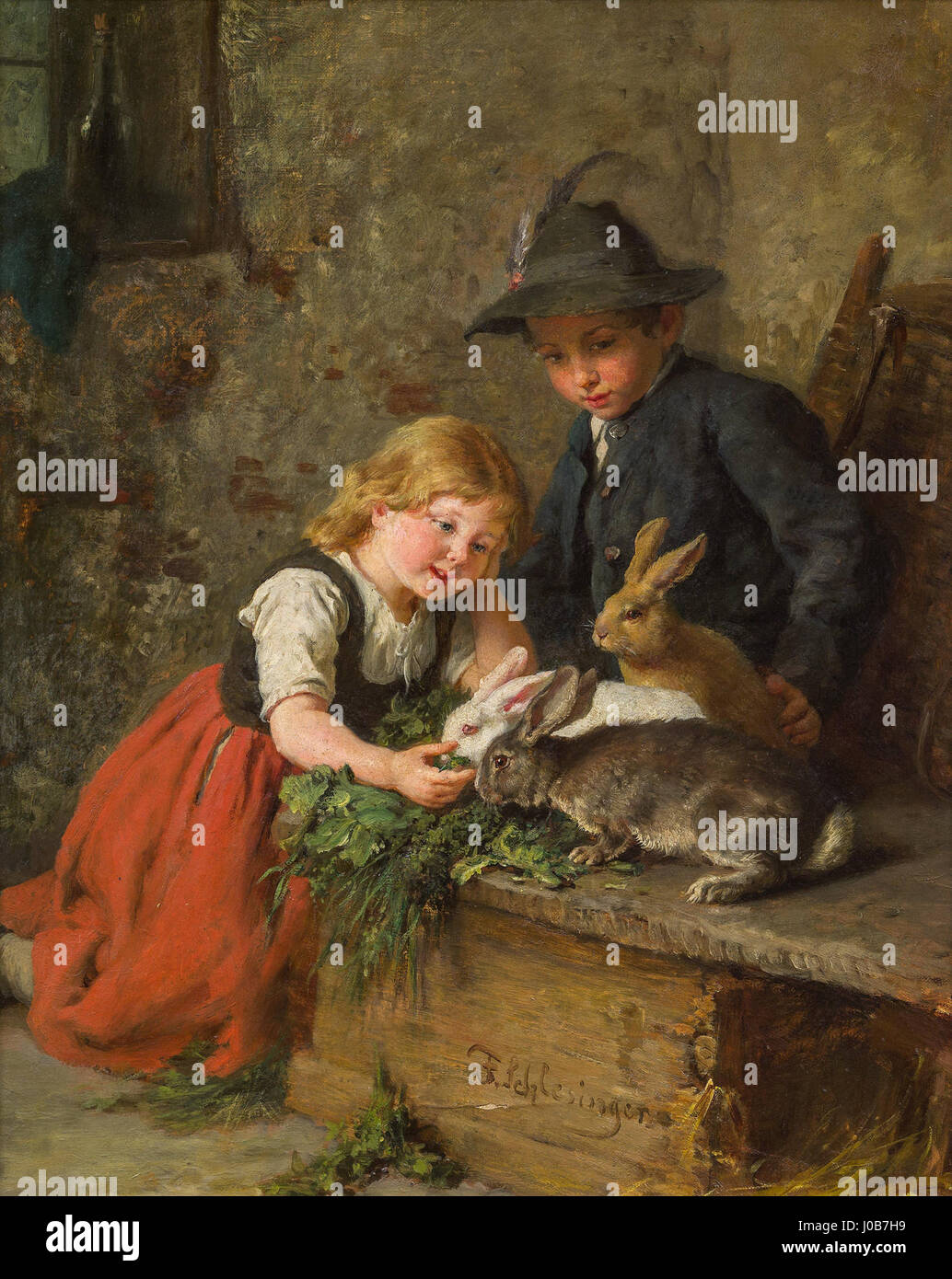 Felix Schlesinger - Zwei Kinder füttern Kaninchen Stock Photo