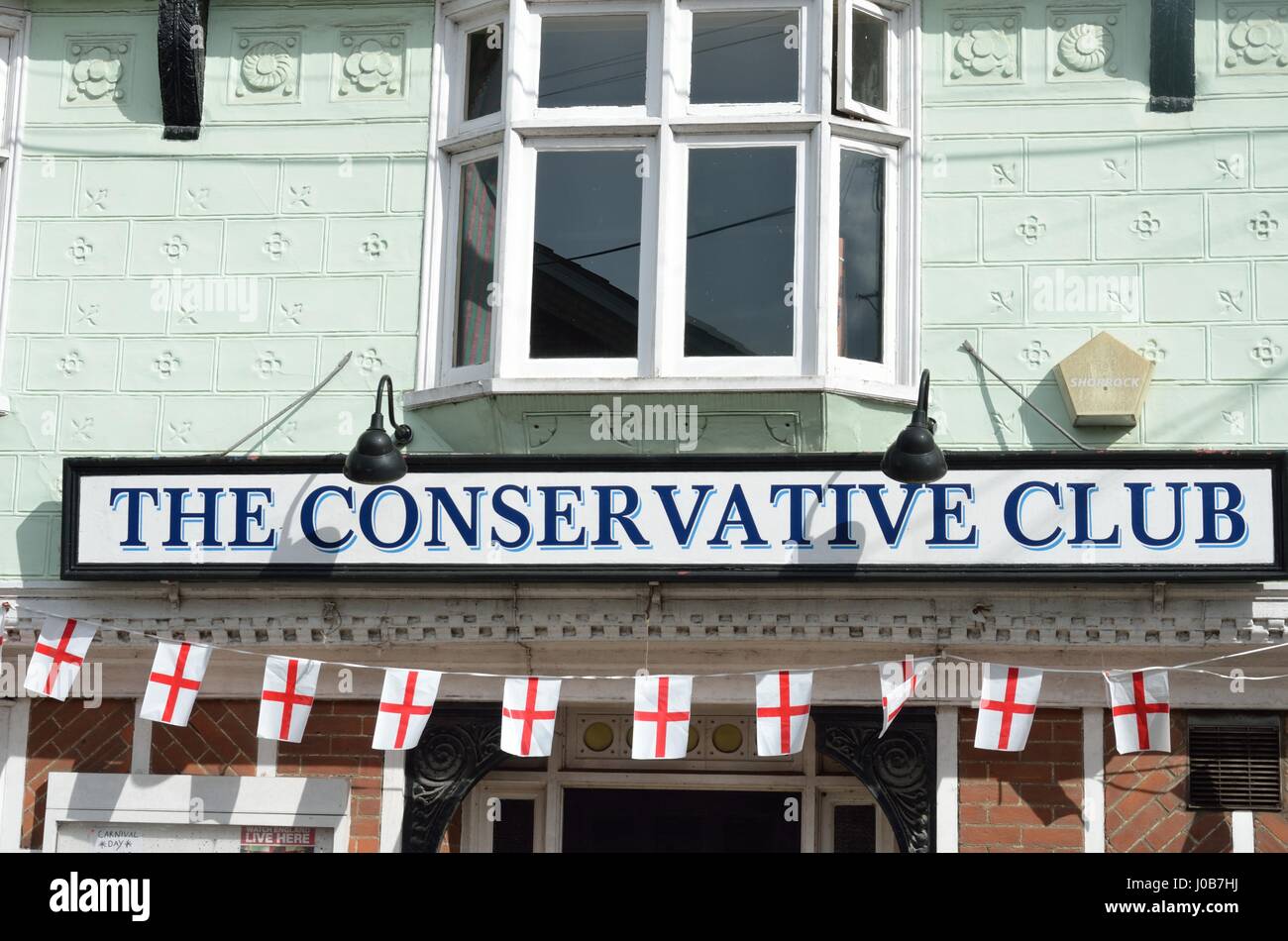 Conservative club sign with george flags Stock Photo