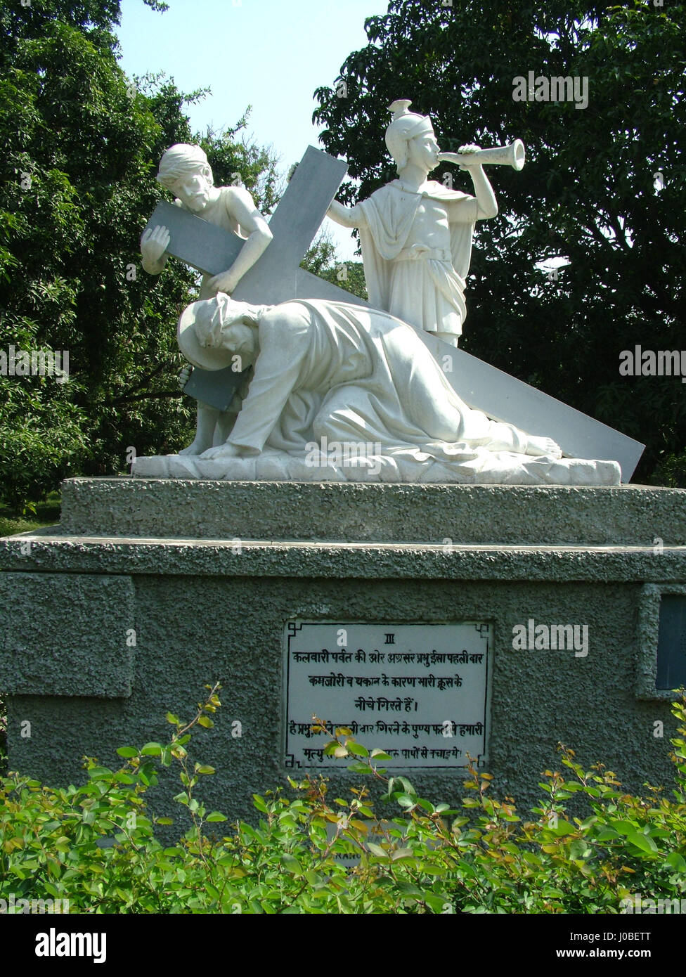 Statue: Third Station, Jesus falls the first time. Basilica of Our Lady of Graces, Begum's Church, Sardhana (Copyright © by Saji Maramon) Stock Photo