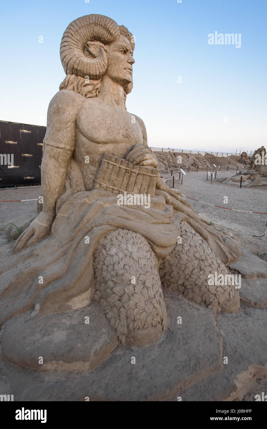 Satyr. ANTALYA, TURKEY: FROM the Pyramids of Egypt to mighty Viking god Thor these amazing works of art that are made from just sand and water. The theme of this year’s from Antalya International Sand Sculpture Festival is the ‘Seven wonders of the world and mythology’ and the spectacular sculptures include the Taj Mahal, The Sphinx and the Inca Pyramids. Other sculptures include mythical gods from a range of ancient cultures including Neptune from Greece, Thor from the Vikings and Horus from Ancient Egypt. Once night falls the sculptures are lit up by a colourful lighting system. The pictures Stock Photo