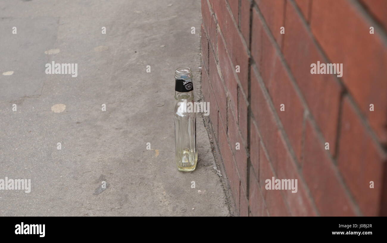 a empty drinks bottle on street Stock Photo