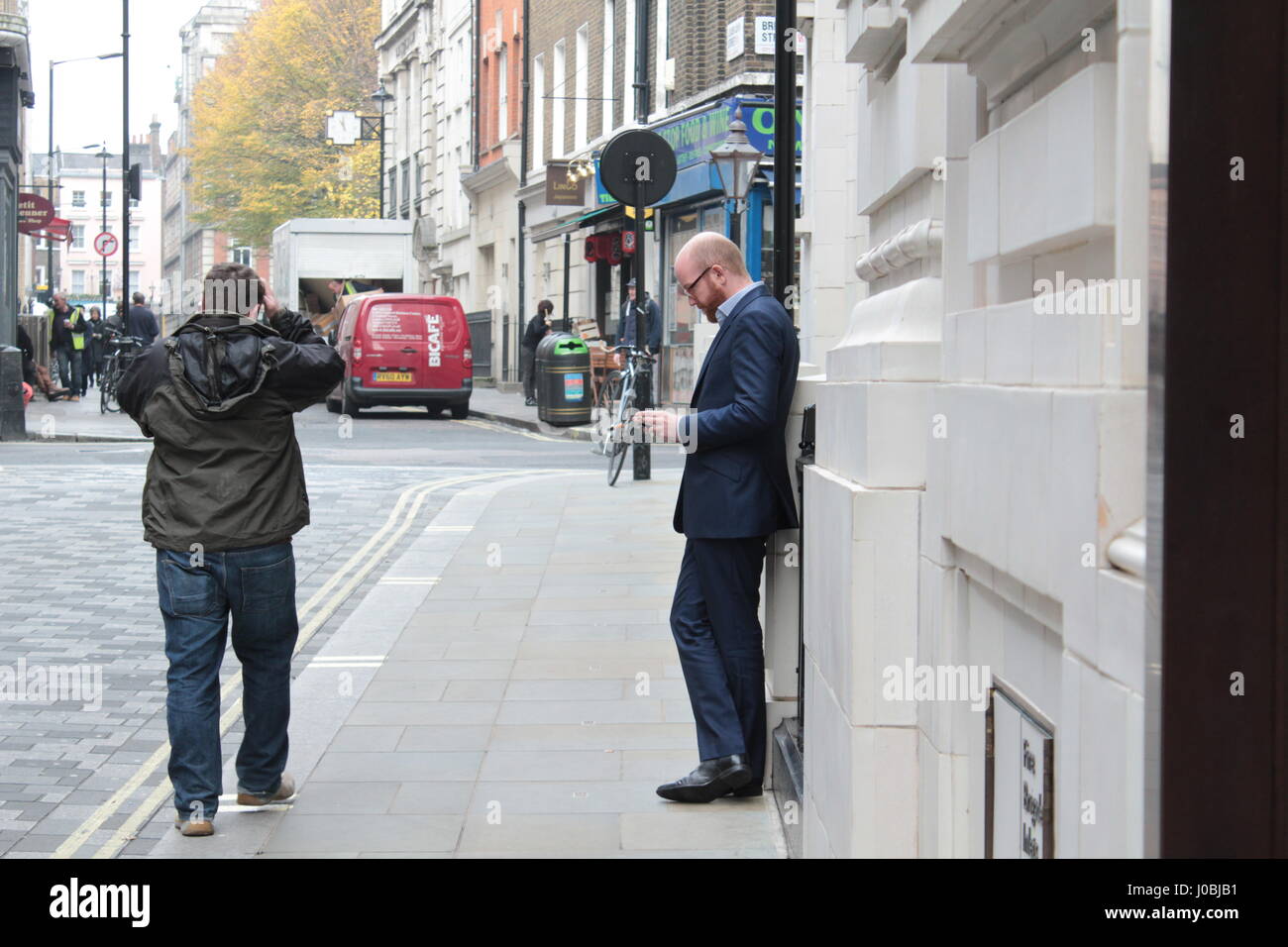 Man standing on corner hires stock photography and images Alamy