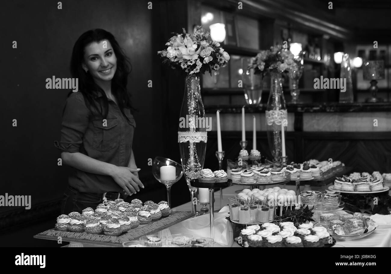 table with sweets and a variety of sweet snacks against the back Stock ...
