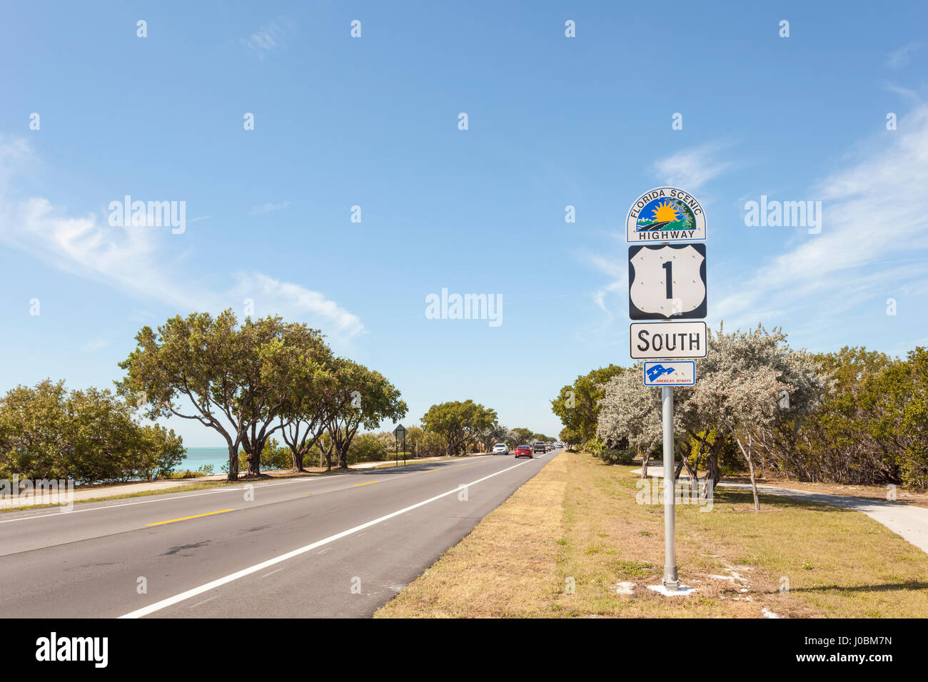 Key Largo, Fl, USA - March 16, 2017: Florida scenic highway number one direction south on the Florida Keys, United States Stock Photo