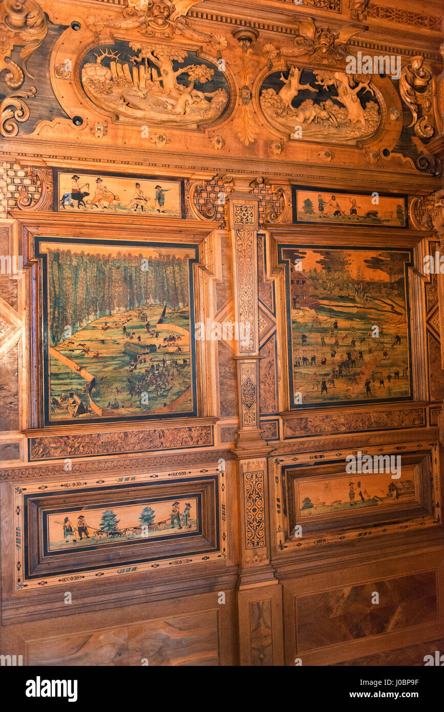 Ornate inlaid timberwork on a wall in Veste Coburg. Stock Photo