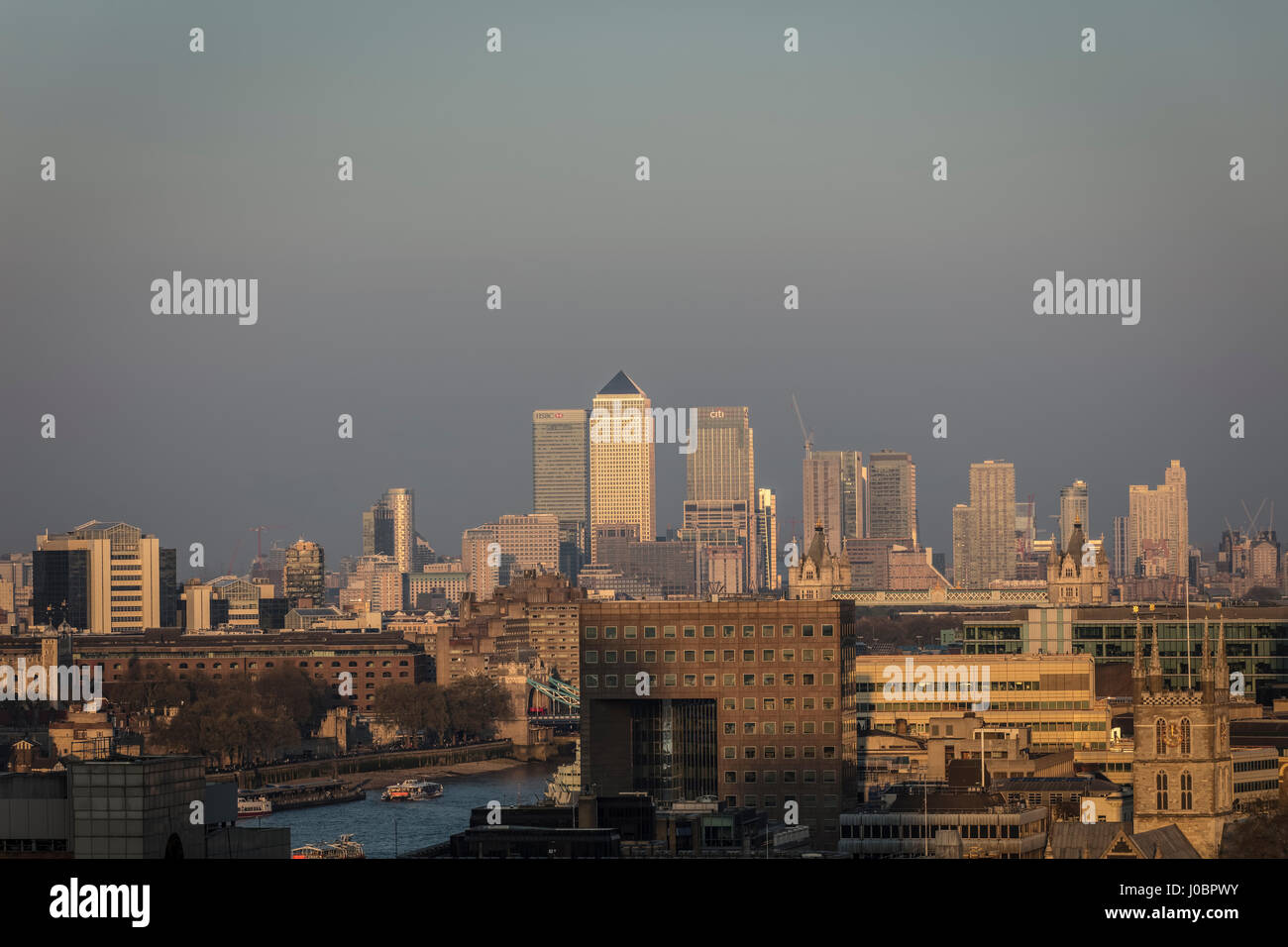 London docklands Canary Wharf buildings at sunset Stock Photo - Alamy