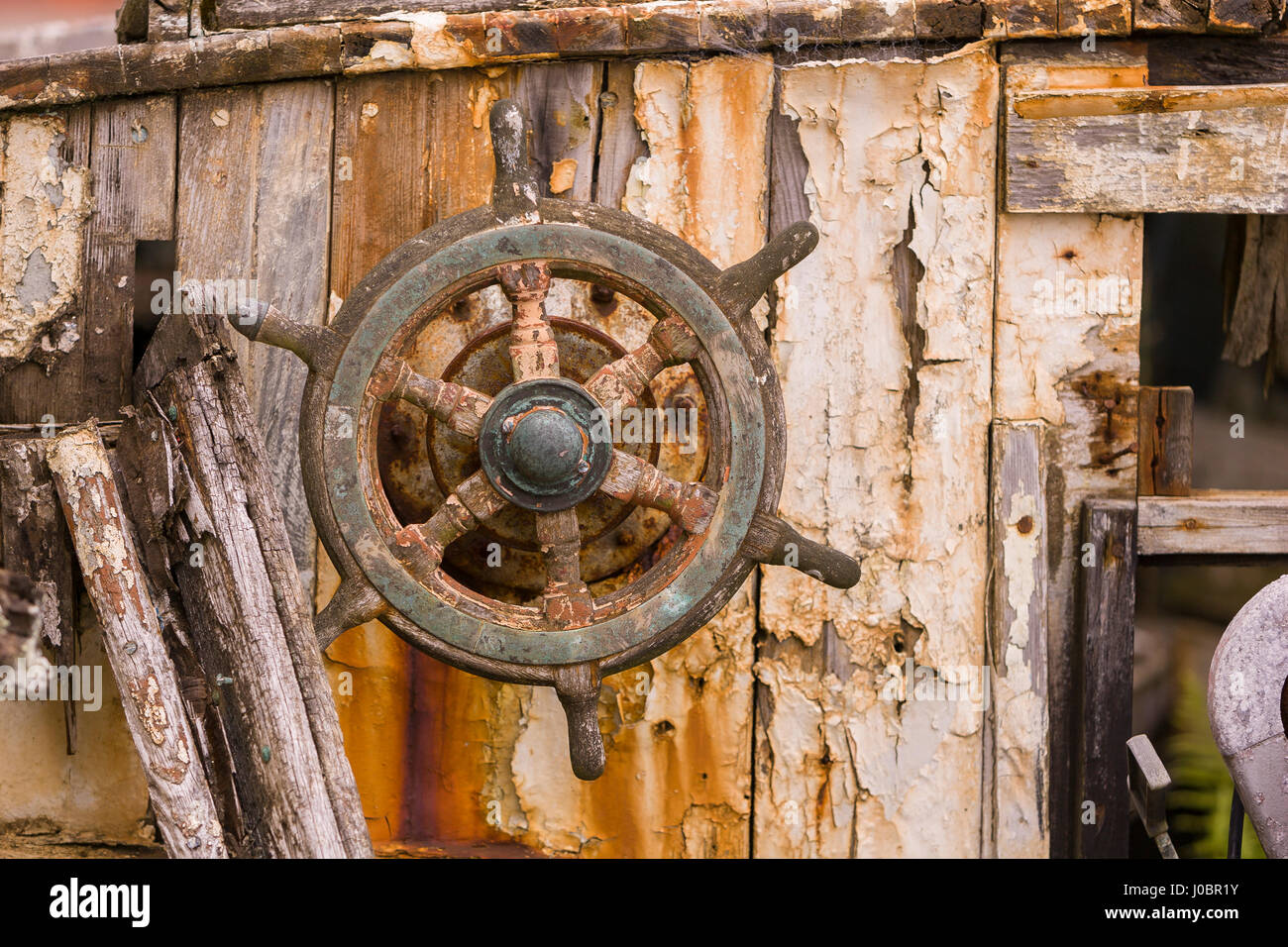 ARAN ISLAND, DONEGAL, IRELAND - Helm, steering wheel, old abandoned boat, Arranmore or Aran Island. Stock Photo